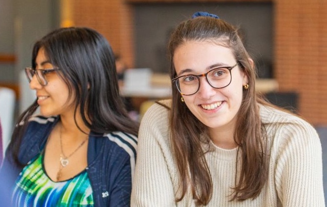 College of Arts and Sciences student talking with friends