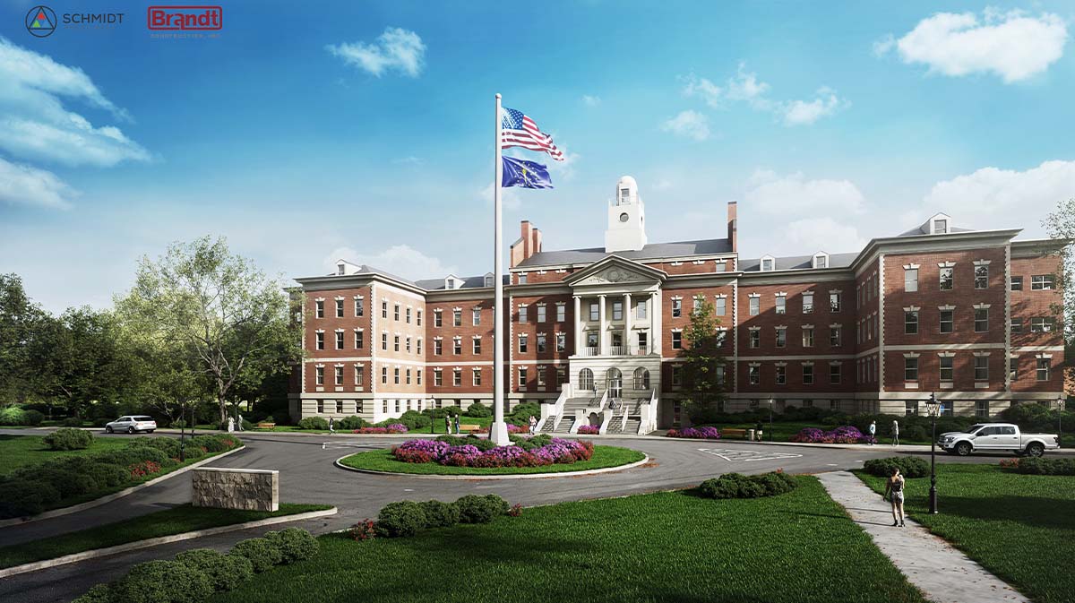 Architectural illustration of a building featuring an American flag in front, surrounded by landscaped greenery and floral areas.